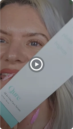 Woman holding Qure All-in-One Face Serum - Review