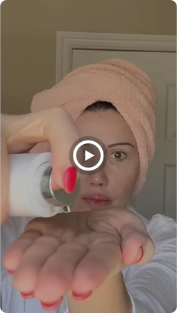 Woman applying product to hand