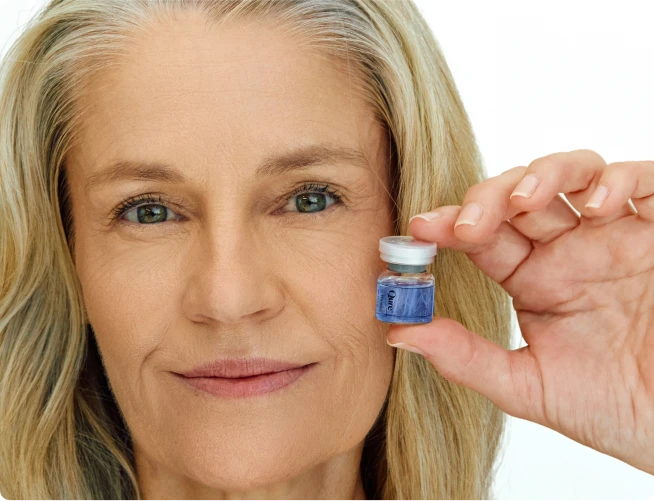 Micro infusion banner with woman holding serum vial