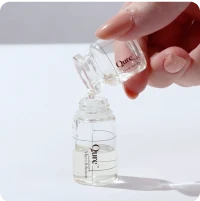 Chure product being poured into a small bottle.