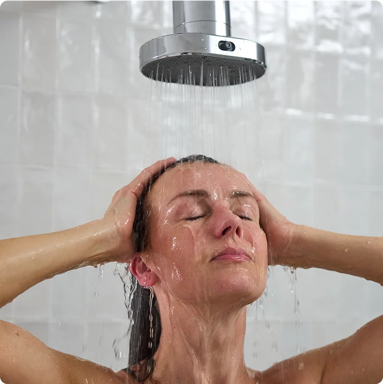 Woman enjoying shower under water