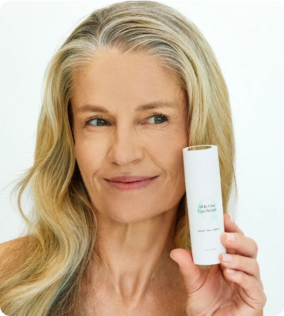 Woman holding anti-aging serum